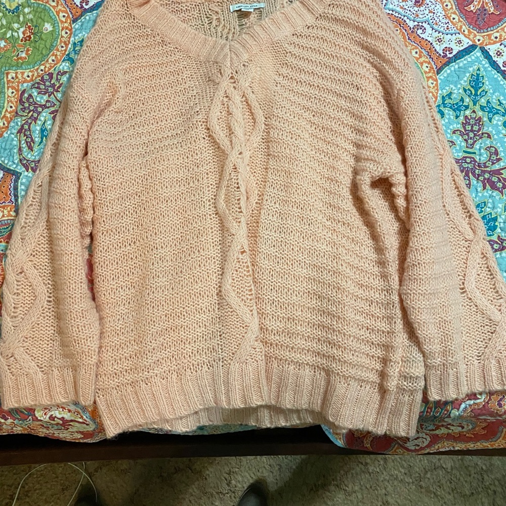 American Eagle sweater xs but made big. Never wore still has tag on it